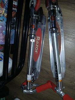 2 adjustable scooters
