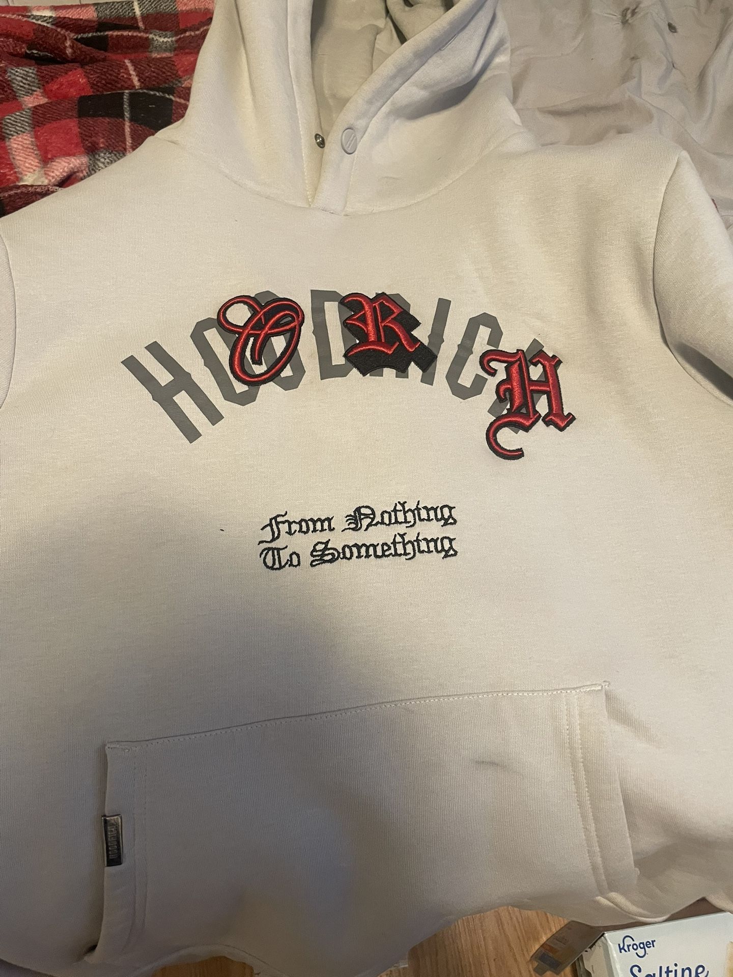 White hoodrich hoodie with red and black accents 