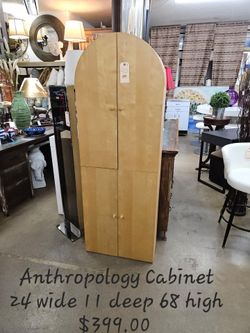 Cabinet Anthropology Blonde We are located at 2811 East Bell road. Another Time Around Furniture.