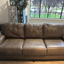 Genuine leather couch and  chair w/ ottoman