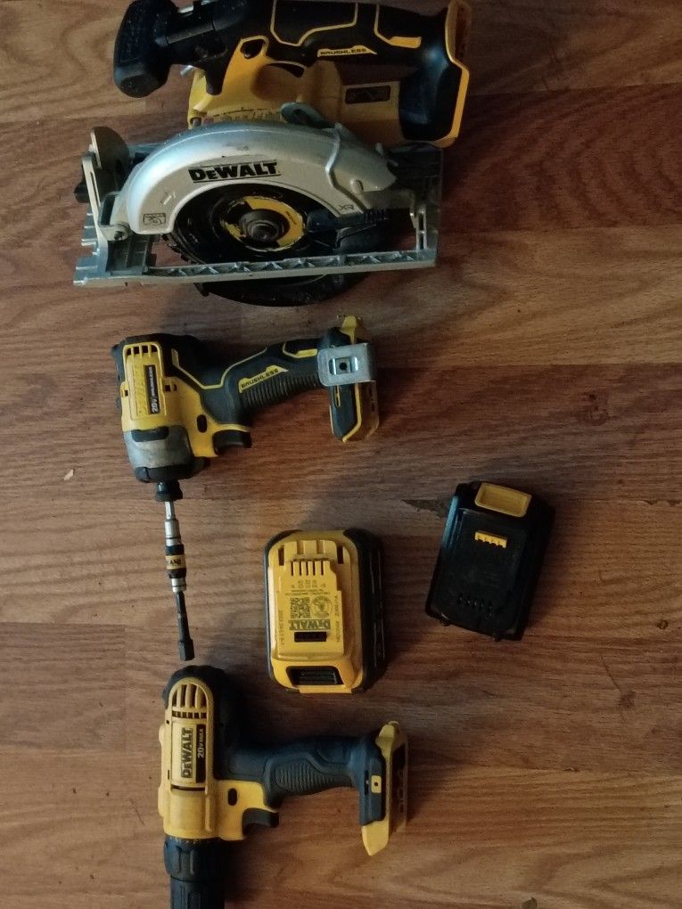 DeWalt 20volt Tools Set Drill, Saw , And An Impact Driver Battery And Charger Also.