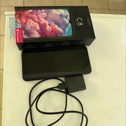 Cloud Mobile C8 smartphone with charger.