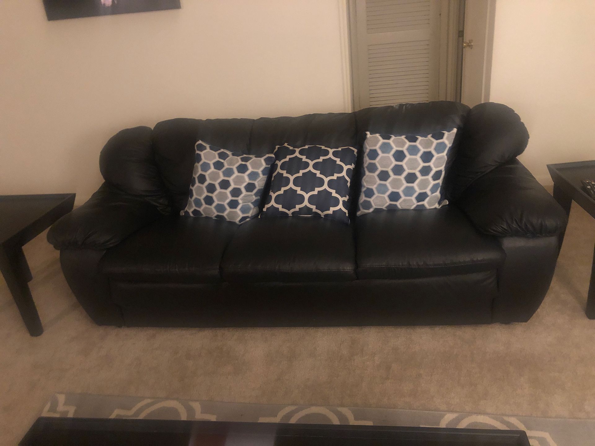 Black leather couch perfect condition!!