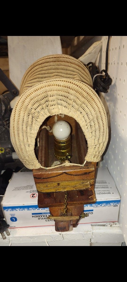 Vintage Covered Wagon That Has A Light Tobturn On Or Off