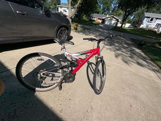 Dyncraft Magna Exciter 21 speed dual suspension mountain bike 26”wheels  Rear tire has worn out side walls so I am throwing in a free tire and inner t