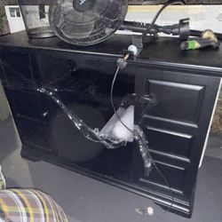 Wooden cabinet or desk with compartments. 