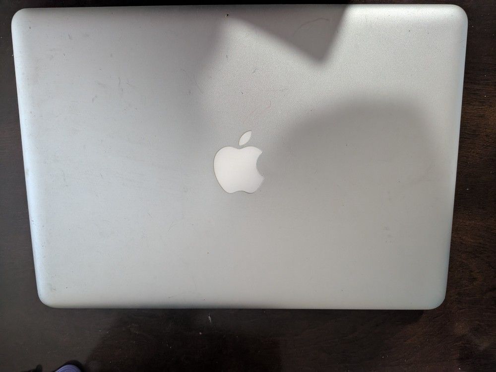 Older Mac Book Pro ( No Charger) Best Offer