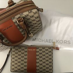 Michael Kor authentic Clutch Only for sale In the Photo