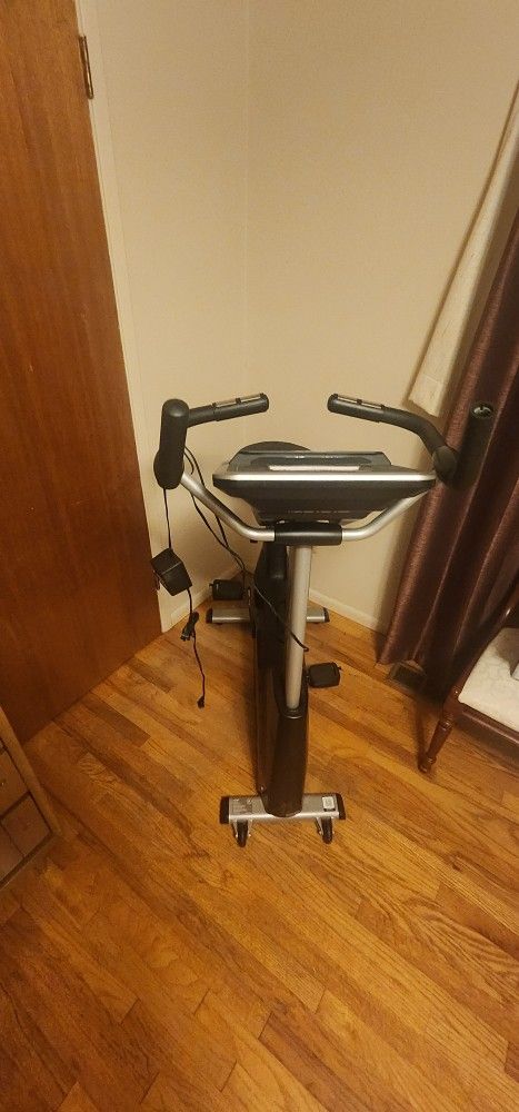 Spirit XBU55 Upright Bike, 43" X 22" X 54"