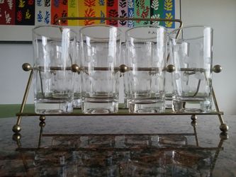 Vintage glass set (8) with caddy.
