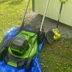 Green works Pro Dual Battery Mower And Free Weed Eater