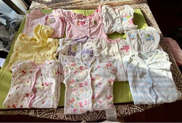 Like New set of 10 cotton material-baby pajamas in size 3 to 9 months old