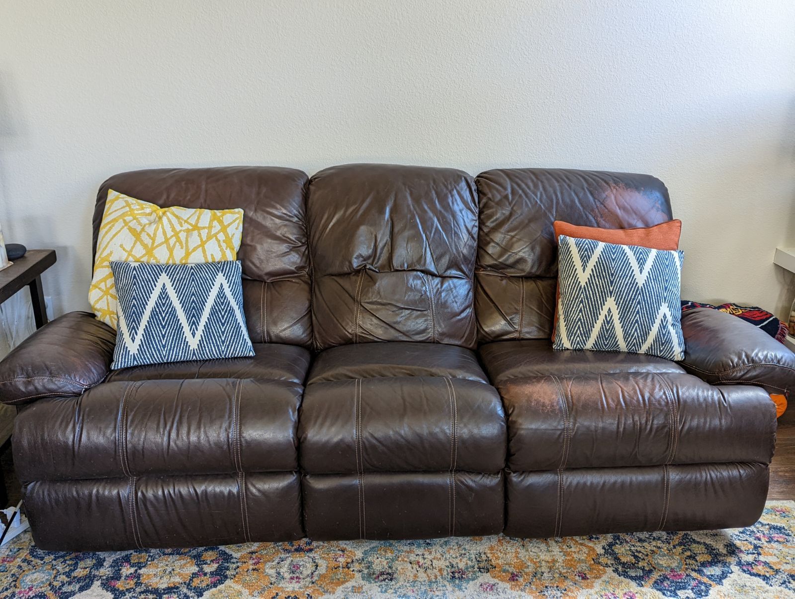 Brown Leather Reclining Sofa