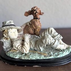 Decorative Figurine of a Sleeping Boy with his Dog, likely Milano Collection