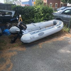 West Marine 12 Foot Fiberglass Bottom With 3.5 Mercury With Oars And Lifejackets 