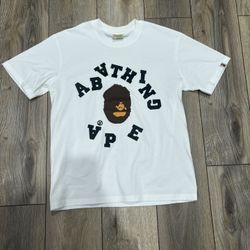 White BAPE t-shirt with black logo and graphic #streetwear