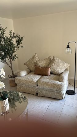 Living room furniture, gray couch, large mirror, mirror table