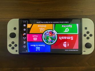 NINTENDO SWITCH OLED & MARIO GAMES
