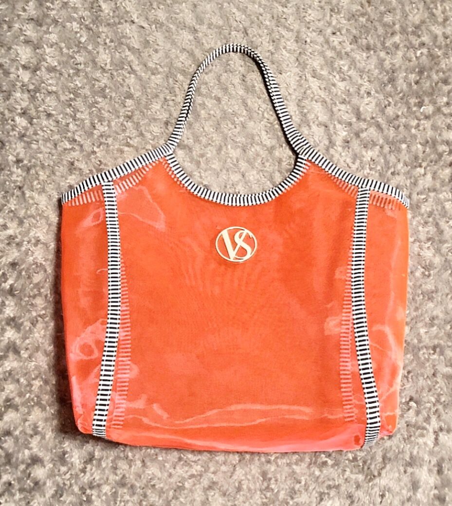 New! Victoria’s Secret pink tote paid $48 This “VS” Oversized Mesh Beach Tote Bag is hot pink mesh with black & white striped trim handles. Measureme