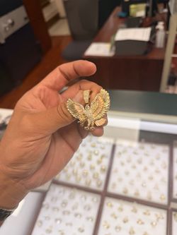 Eagle 14k and crystal pendant 11.6gm