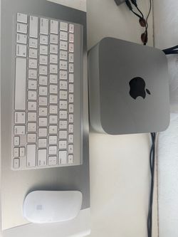 Mac Studio with keyboard and mouse, mic, interface & KRK speakers