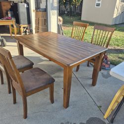 Heavy Wood Table And Chairs.