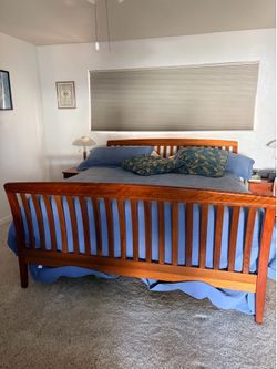 Cherrywood king-sized sleigh bed