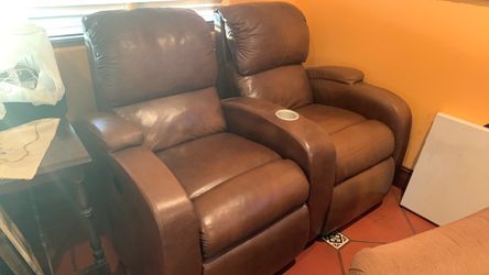 Brown faux leather reclining sofa