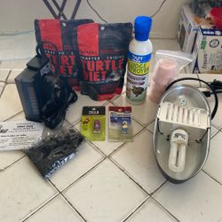 Turtle supplies, turtle filter, heat lamp, turtle food, , extra halogen bulbs Light Is $70 Bucks Alone