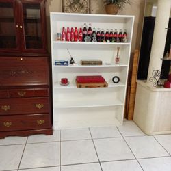 Solid Wooden Book Shell. 46" Inches Long 67" Inches Height 10" Inches Depth Good Condition $35