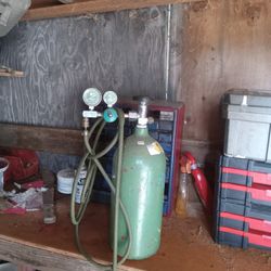 Cutting Torch Tank And Gages With The Hose And Half Of The Wand