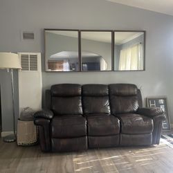 Brown  recliner leather Couch 100.00