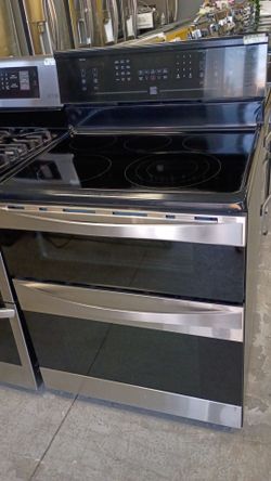 Electric Glass top double oven with warranty delivery available fee depends on address