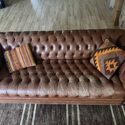 Tufted leather couch
