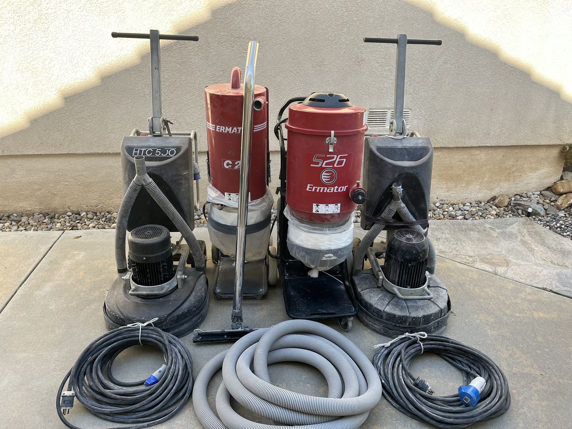 2 HTC 500 Concrete Grinders With Hepa filter Vacuum