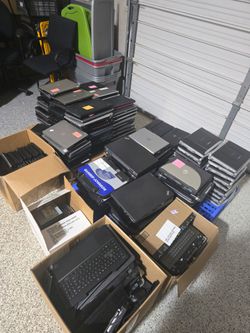 Lot of 200 Laptops. MAJORITY POWER ON.  + Additional Computer Components.