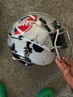 Helmet and shoulder pads