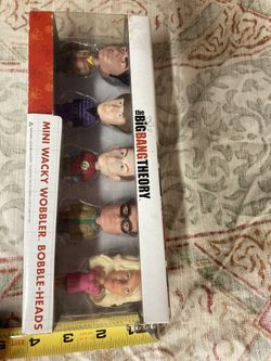This Funko Wacky Wobbler mini bobblehead assortment features characters from The Big Bang Theory Series 1, including Sheldon Cooper. The set includes