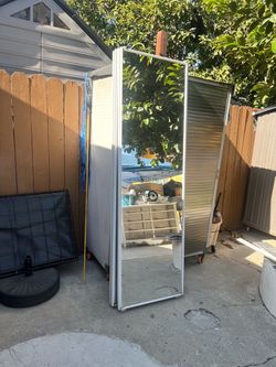 Two sets of mirror sliding closet door