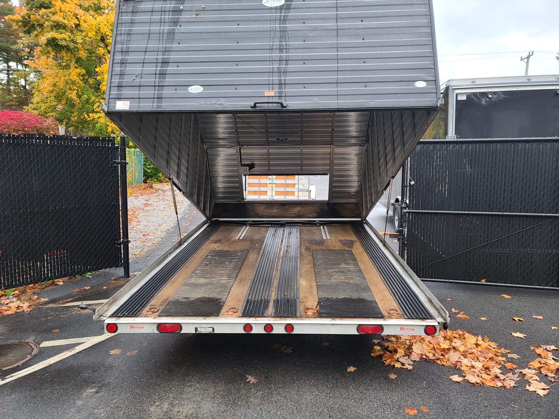 2005 Triton 12’x101” enclosed clamshell 2 place all aluminum trailer
