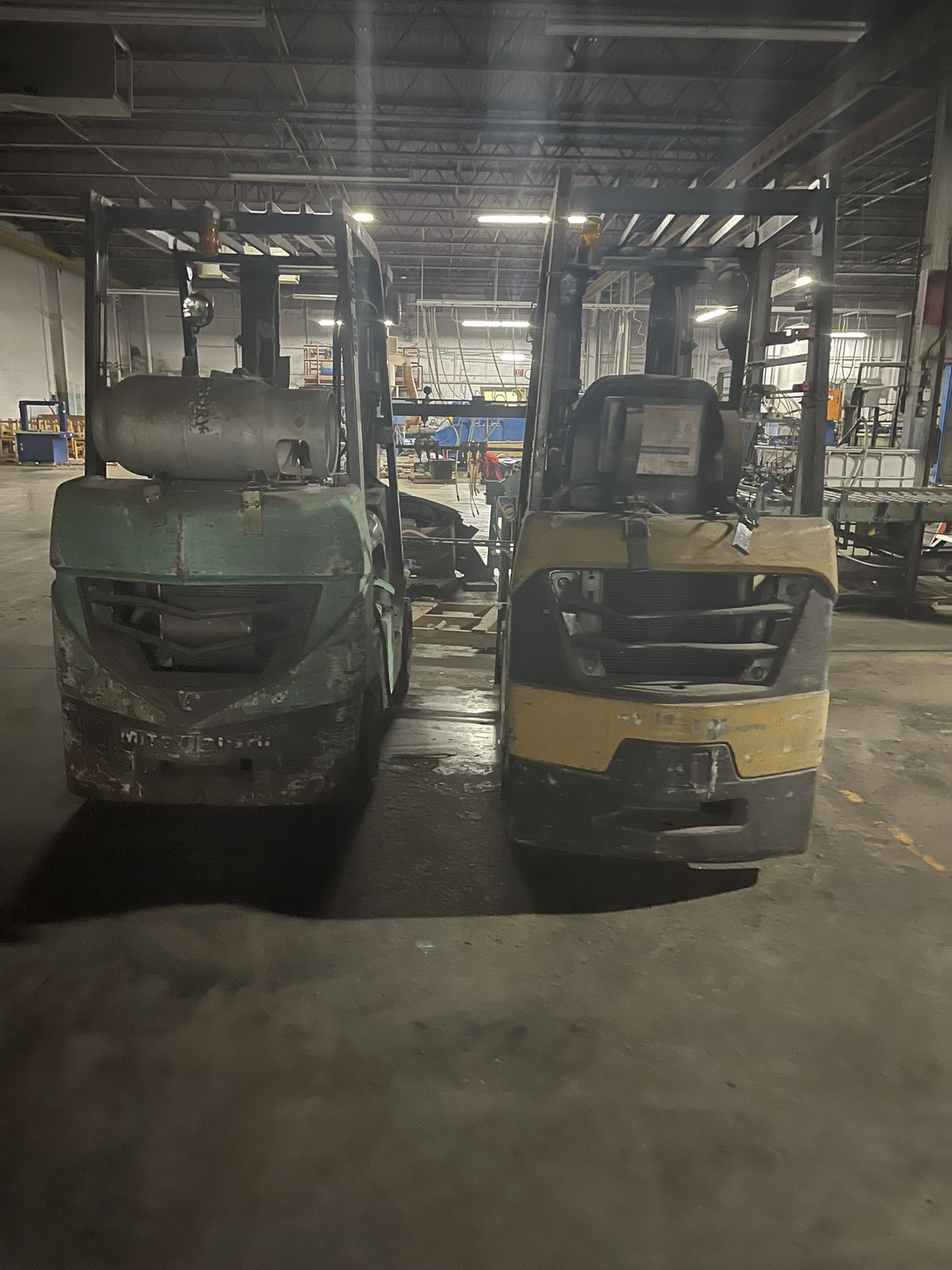 (2) Forklifts For Sale As Is. (1) 5000# Mitsubishi (1) Cat 3000#