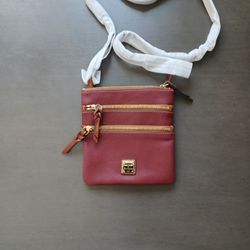 Dooney Bourke Wine Color for Sale in North Las Vegas NV