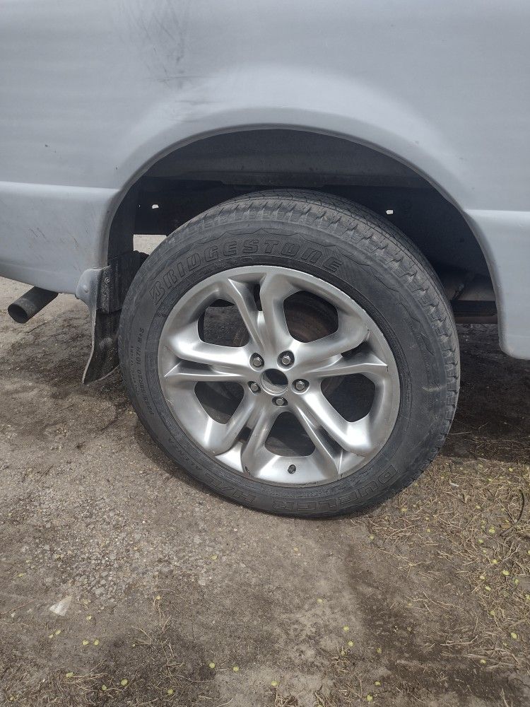 Set Of 4 Wheels, Rims, And Tires For A Ford Explorer