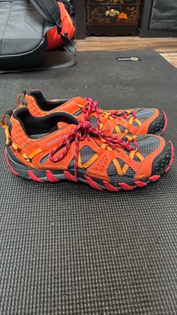 Merrell Waterpro Maipo hiking shoes in a spicy orange and dark grey colorway.