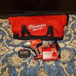 Milwaukee M18 1/2 High Tourque Impact Wrench W/ Friction Ring, M18 Redlithium XC3.0 Battery, M18 And M12 Multi- Voltage Charger & Large Contractor Bag