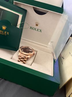 Rolex day date rose gold