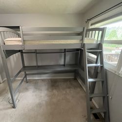 Twin Gray Loft Bed With Desk and Small Shelves