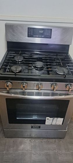 Moving out of state have this 5 burner gas stove selling cheap