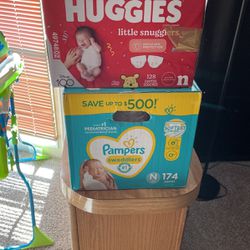 Two Brand New Boxes Of Newborn Diapers 