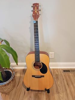 Jasmine acoustic guitar and stand